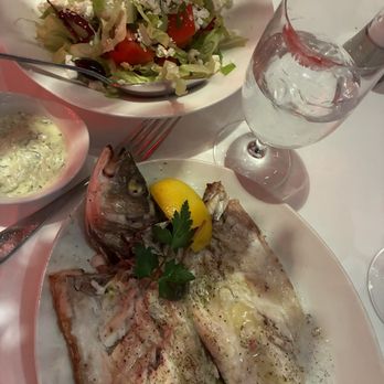 Avra Rockefeller Center - Fresh branzino; romaine salad added tomato - Greek Near Me - New York, New York Avra Rockefeller Center - Fresh branzino; romaine salad added tomato - Greek Near Me - New York, New York