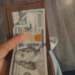 Broad Ripple Trails - The money he gave her with the supervisors signature in the background on his ID. He is sitting on Soliber Matute's couch