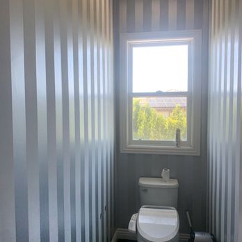 IP Wallpapering & Flooring - a toilet and window - Wallpapering Near Me