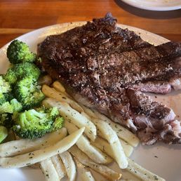 Rib eye. And fries.  Very tasty broccoli also