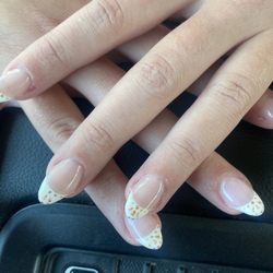Nails On Main - Almond French tips with design.