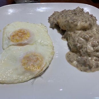 Red Rooster Cafe - Half order of Grandma's Biscuits and Gravy and two fried eggs. - Breakfast & Brunch Near Me - Beaufort, South Carolina Red Rooster Cafe - Half order of Grandma's Biscuits and Gravy and two fried eggs. - Breakfast & Brunch Near Me - Beaufort, South Carolina