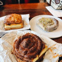 Breakfast Sammy on a croissant with baked egg and cheddar. London fog glazed twist (up right) Breakfast Sammy on a croissant with baked egg and cheddar. London fog glazed twist (up right)