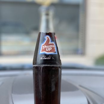 Bombay Kitchen 419 - a bottle of pepsi on the dashboard of a car - Indian Near Me - Toledo, Ohio Bombay Kitchen 419 - a bottle of pepsi on the dashboard of a car - Indian Near Me - Toledo, Ohio