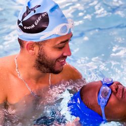 Swim Easy New York - Swim Easy instructors always pay close attention to swimmer's needs. Coach Joel with one of our students