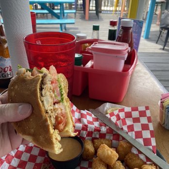 The Sandbar - Redfish Sandwich, blackened with smoked Gouda cheese - Seafood Near Me - Pensacola Beach, Florida The Sandbar - Redfish Sandwich, blackened with smoked Gouda cheese - Seafood Near Me - Pensacola Beach, Florida