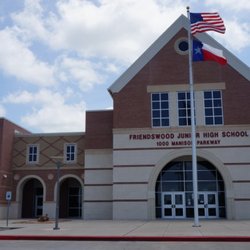 Friendswood Junior High School - this is the front of the school where kids gather around the flags and pray for Prayer around the pole