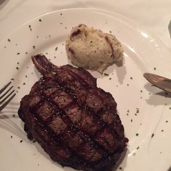 Downtown Grill - Cowboy Cut ribeye with mashed potatoes. 8oz bigger than the ribeye on the menu. - Steakhouses Near Me - Macon, Georgia Downtown Grill - Cowboy Cut ribeye with mashed potatoes. 8oz bigger than the ribeye on the menu. - Steakhouses Near Me - Macon, Georgia