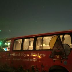 Red Eye Rides - Red Eye Rides is waiting on a late night flight watching bans of Auroras in the cell phone lot. Lake Hood 
September 2023 - Photo by Angel