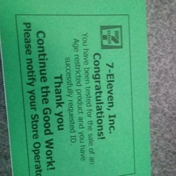 7-Eleven - a close up of a green business card - Convenience Stores Near Me - Auburn, Washington