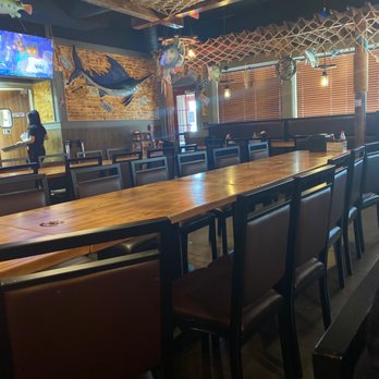 Red Crab - Juicy Seafood - a restaurant with tables and chairs - Seafood Near Me - Jensen Beach, Florida Red Crab - Juicy Seafood - a restaurant with tables and chairs - Seafood Near Me - Jensen Beach, Florida