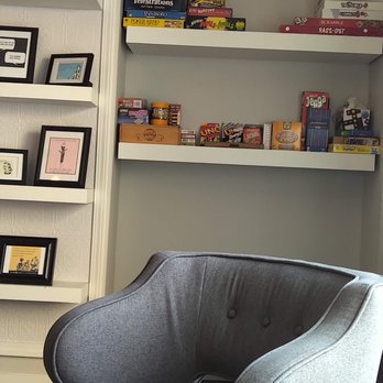 Grape Water Wine Bar - Shelves full of games to play while you sip and chat! - Wine Bars Near Me - Middleton, Wisconsin
