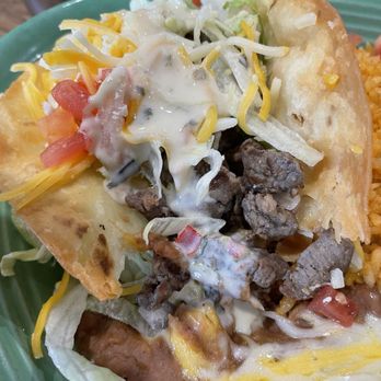 Rapido's Restaurant - Steak puffy Taco- delicious with House dip! Order it to add! - Mexican Near Me - Platte City, Missouri Rapido's Restaurant - Steak puffy Taco- delicious with House dip! Order it to add! - Mexican Near Me - Platte City, Missouri
