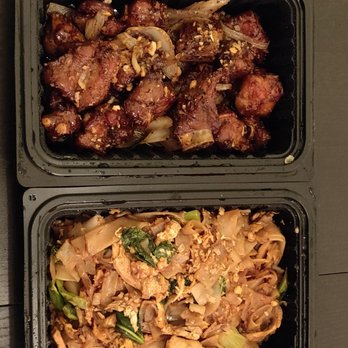 Sip Saam Thai - Thai spare ribs on top and Pad Se-ew on the bottom - Thai Near Me - Austin, Texas Sip Saam Thai - Thai spare ribs on top and Pad Se-ew on the bottom - Thai Near Me - Austin, Texas