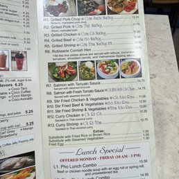 The menu lists various Vietnamese rice plates, grilled meats, seafood, and lunch combos, with prices and descriptions, including options like grilled pork, chicken, beef, shrimp, and curry dishes.