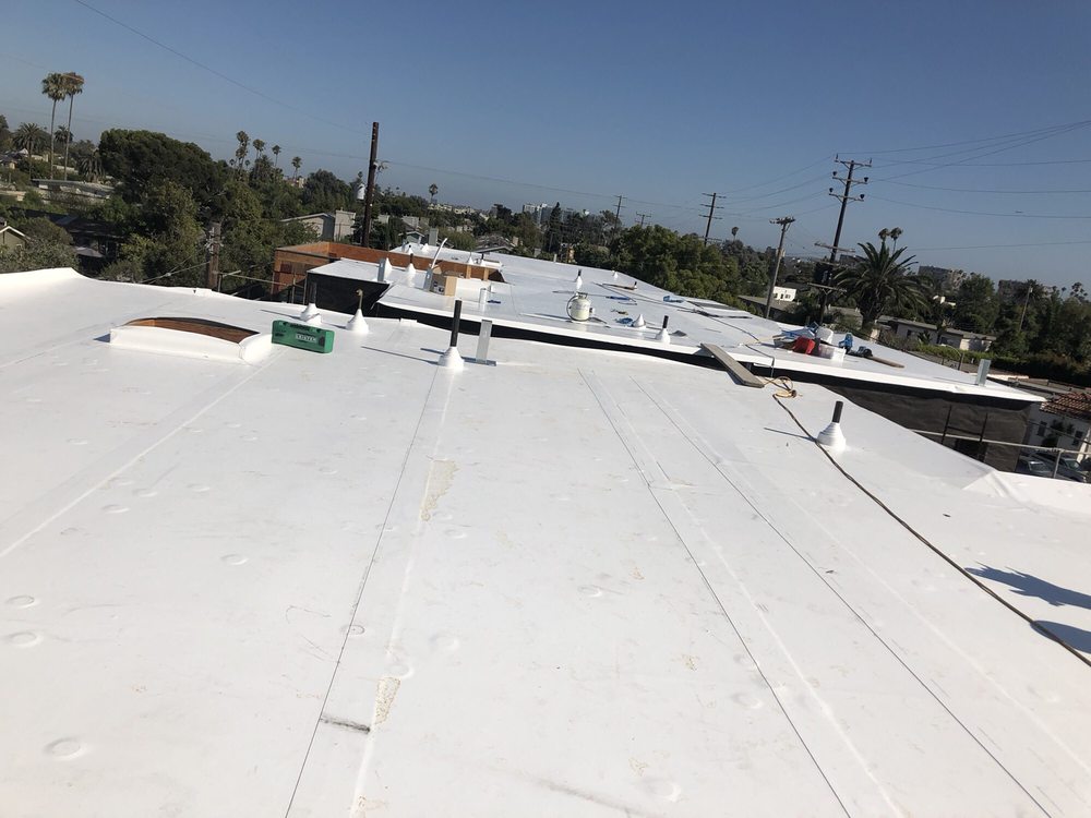 Slide of Lopez Roofing