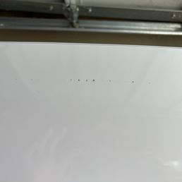 Paint missing at the top of the freezer door. Paint missing at the top of the freezer door.