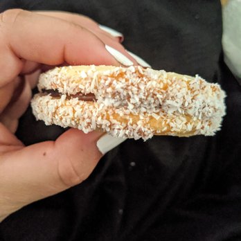 Casa Del Alfajor - Delicious, one of my favorites. Shredded coconut around the cookie. - Coffee & Tea Near Me - Concord, California