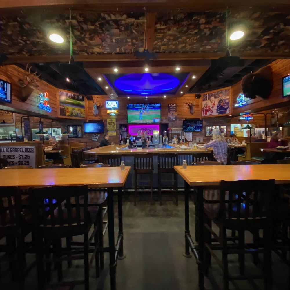 In the center is the large bar. There are large seating areas for diners on 3 sides of the bar. In the center is the large bar. There are large seating areas for diners on 3 sides of the bar.