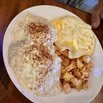 Biscuits and Bourbon - Biscuits & gravy with eggs & potatoes - New American Near Me - Henderson, Nevada