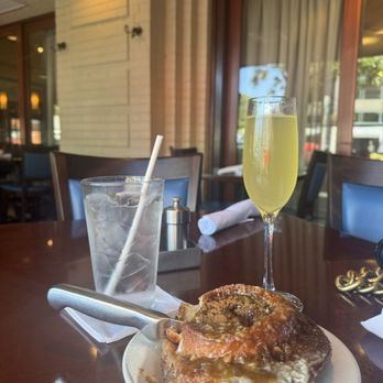 Oceano Bistro - Apple caramel donut dessert and passion fruit mimosa - Seafood Near Me - Clayton, Missouri Oceano Bistro - Apple caramel donut dessert and passion fruit mimosa - Seafood Near Me - Clayton, Missouri