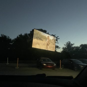 Tibbs Drive-In Theatre - Can see the movie totally fine even if the sun isn't fully set. We were the leftmost car and could still see fine. - Drive-In Theater Near Me - Indianapolis, Indiana Tibbs Drive-In Theatre - Can see the movie totally fine even if the sun isn't fully set. We were the leftmost car and could still see fine. - Drive-In Theater Near Me - Indianapolis, Indiana