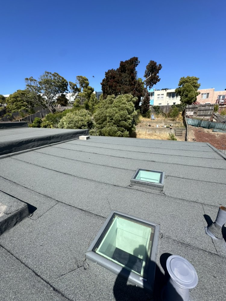 Slide of Rene’s Roofing