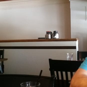JaK's Grill - Dangerous, full coffee pots sitting on the banister. - American Near Me - Seattle, Washington