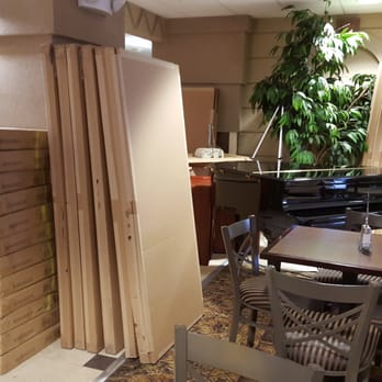 Holiday Inn Express Toledo-Oregon - Breakfast room where a guy dropped a box next to us. No quiet here. - Hotels Near Me - Oregon, Ohio