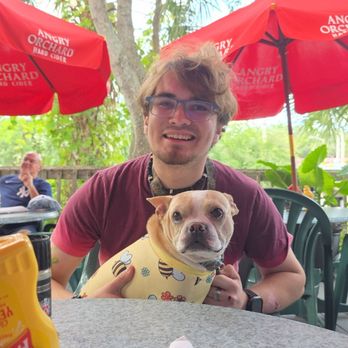 Metro Diner - My son who is disabled at another restaurant holding my service dog. Notice she isn't touching anything. He has a bad tbi - Breakfast & Brunch Near Me - Jacksonville, Florida Metro Diner - My son who is disabled at another restaurant holding my service dog. Notice she isn't touching anything. He has a bad tbi - Breakfast & Brunch Near Me - Jacksonville, Florida