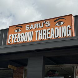 Saru’s Eyebrow Threading - Business signs indicate