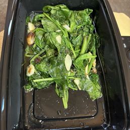 A side of sautéed spinach, $8., the bread was stale, only 3 scallops, 4 shrimps for a 30,00 entree. Sad $50. delivery . A side of sautéed spinach, $8., the bread was stale, only 3 scallops, 4 shrimps for a 30,00 entree. Sad $50. delivery .