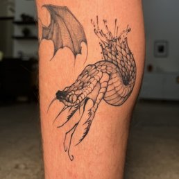 Ripped apart snake done by Josue. Ripped apart snake done by Josue.