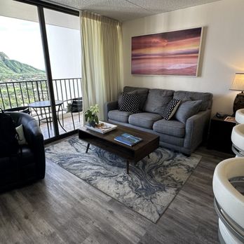 Waikiki Banyan - Living Room & Balcony - Apartments Near Me - Honolulu, Hawaii Waikiki Banyan - Living Room & Balcony - Apartments Near Me - Honolulu, Hawaii