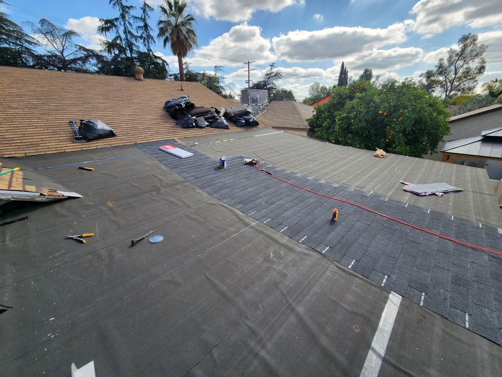 Slide of Archyk Roofing