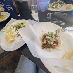 Beef taco salad, shrimp taco, barbacoa taco, and hibiscus drink.