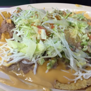 Fiesta Burrito - Canned cheese on nachos, sorry but my wife is a vegetarian she always try's the nachos. Not good microwaved. - Mexican Near Me - Naperville, Illinois Fiesta Burrito - Canned cheese on nachos, sorry but my wife is a vegetarian she always try's the nachos. Not good microwaved. - Mexican Near Me - Naperville, Illinois