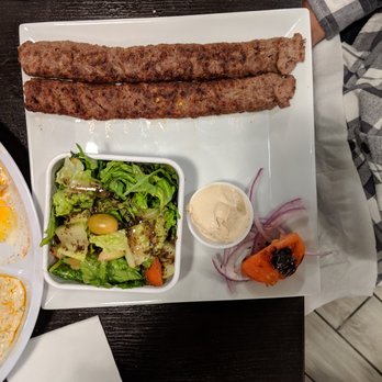 Kababchi Grill - Beef kabob (kofta) with Mediterranean salad - Middle Eastern Near Me - San Antonio, Texas Kababchi Grill - Beef kabob (kofta) with Mediterranean salad - Middle Eastern Near Me - San Antonio, Texas