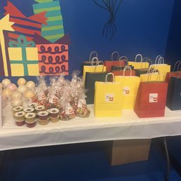 Candy table w/ thank you bags. Cotton candy favors provided by The Cotton Candy Palace and popcorn favors by Chef Inspired Popcorn