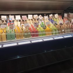 Paleta's waiting to be dipped in toppings.