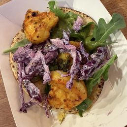 The shrimp roti taco is fantastic. The shrimp roti taco is fantastic.