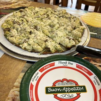 Giuseppe's Pizzeria - Gluten free crust with basil pesto base, chicken, mushrooms, and artichokes! - Pizza Near Me - Delafield, Wisconsin
