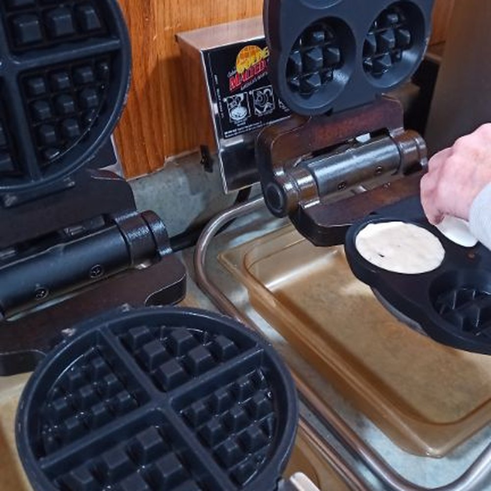 Quality Inn - Waffle maker in the dining room for breakfast! Instructions for use on the wall. After using a cup to dish out the batter, turn it upside do - Hotels Near Me - Bath, New York