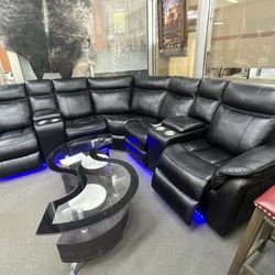 NG Furniture & Flooring Outlet - Power recline couch with cup holder music phone charger and led :)