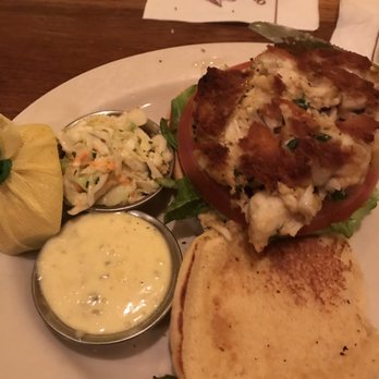 Old Ebbitt Grill - Crab cake sandwich (which I smooshed to fit the bun! Should have snapped pic first as it was a solid 3 inches thick) - Bars Near Me - Washington, DC, District of Columbia Old Ebbitt Grill - Crab cake sandwich (which I smooshed to fit the bun! Should have snapped pic first as it was a solid 3 inches thick) - Bars Near Me - Washington, DC, District of Columbia