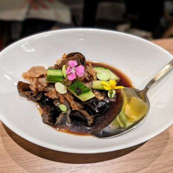Octo - a plate of food on a table - Korean Near Me - New York, New York Octo - a plate of food on a table - Korean Near Me - New York, New York