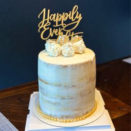 White cake, blue background White cake, blue background