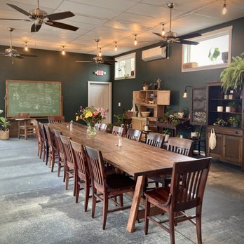 Pothos Coffee - a table and chairs in a large room - Coffee & Tea Near Me - Imperial, Missouri Pothos Coffee - a table and chairs in a large room - Coffee & Tea Near Me - Imperial, Missouri