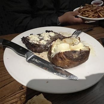 Local Goat - Flame-Grilled Ribeye* - New American Near Me - Pigeon Forge, Tennessee