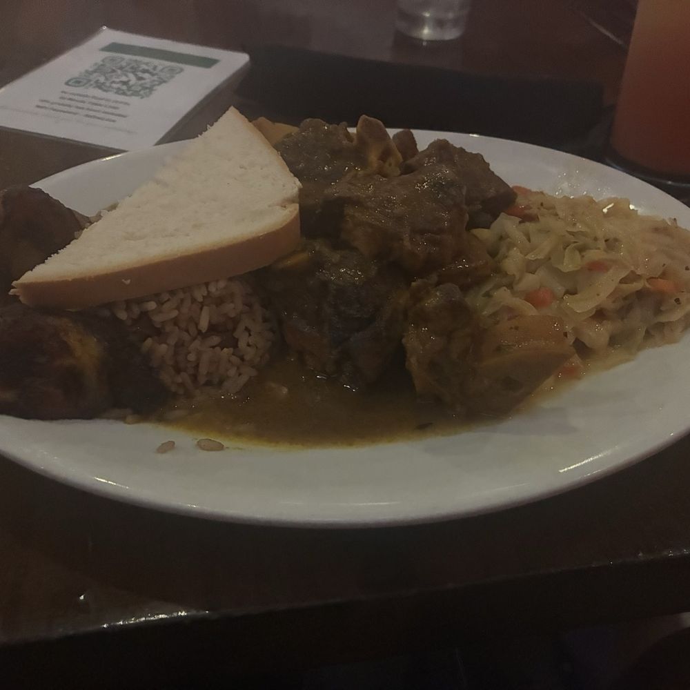 Curry goat entree Curry goat entree